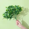 Fabricantes de origen al por mayor planta verde artificial césped de plástico serie niebla decoración de boda para el hogar ramo arreglo floral pared de plantas