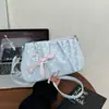 Bolsa de Hombro Individual con Lunares Dulces Estilo Coreano Shuai Mi Home para Mujer, Nuevo Bolso Cruzado de Nicho para Viajes de Verano 2026