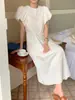 Foto Real del Vestido de Verano 2026 Estilo Coreano Ins Suave y Elegante Cuello Redondo Mangas Abullonadas Largo Medio con Lazo