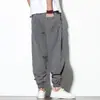 Pantalones Harem Casuales de Lino para Hombre Estilo Chino Otoño 2021 Rayas Retro Combinación de Colores Sueltos Algodón y Lino Botón de Disco