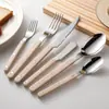 Cuchillo tenedor cuchara de acero inoxidable transfronteriza clip remachado mango cuchara de cena cuchara de postre tenedor cuchillo tenedor para bistec francés vajilla occidental de hotel