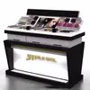Soporte de Exhibición de Cosméticos Acrílico Personalizado de Múltiples Niveles con Panel Trasero Desmontable e Iluminación LED Adecuado para Mostradores de Tiendas Minoristas