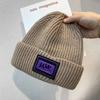 Gorro de punto con etiquetado para niños, estilo coreano, para celebridades de Internet, gorro de lana cálido para invierno y otoño, gorro para estudiantes, suministro de fábrica.