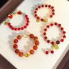 Regalo del Festival de Medio Otoño para la Madre de mi Novia: Pulsera de Loto con Cuentas Rojas Estilo Chino y Diseño de Loto Dorado, Impresión al por Mayor