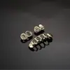 Set de Grillz Estilo Hip-Hop, Grillz Dentales Huecos Chapados en Oro, Moda Urbana Transfronteriza Tendencia Accesorios de Rapper para Escenario Venta al por Mayor