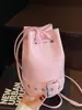 2025 Nueva Moda Coreana Cuero de Cera de Aceite Simple Personalidad Bolso Cubo Moderno Versátil para Viajes Diarios Color Sólido Bolso Cruzado para Mujeres