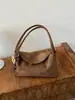 Outono/Inverno 2026 Novo Estilo Coreano Simples Moda Retrô Bolsa de Mão para o Trabalho Tendência Versátil Bolsa de Ombro Único para Sobrancelha