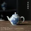Tetera antigua azul y blanca olla individual cerámica juego de té kung fu tetera pequeña filtro de agujero de bola tetera china