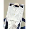 Camiseta de algodón de manga larga con cuello en V abotonado, diseño de copo de nieve para mujer, top blanco moderno y versátil, ropa de mujer Otoño 2026