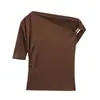 Atacado de Roupas Femininas Prontas de Fábrica para Exportação 2025 Novo Top Camiseta Assimétrico com Pregas Metálicas e Ombro Inclinado na Cintura