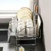 El fabricante suminista un escurridor de cuenco para utensilios de cocina y vajilla, un escurridor de almacenamiento para encimeras del hogar y un estante de almacenamiento para cuchillos y tablas de cortar.