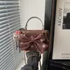2026 Nuevo Bolso de Mano con Cadena Alta Apariencia Lunares Bolso de Hombro para Viajes Diarios ins Moda Personalidad Simple Elegante