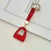 Llavero de bolso con incrustaciones de diamantes de arcilla transfronterizo, lleno de diamantes, accesorio de llavero de coche deslumbrante de alta gama