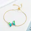 Conjunto de Brincos, Colar, Anel e Pulseira de Vidro Colorido com Diamantes em Formato de Borboleta - Moda Europeia e Americana - Vendido em Larga Escala - Para Mulheres