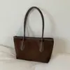 Nueva colección de primavera 2026: Bolso de mano para mujer estilo coreano, con un elegante diseño color block, gran capacidad y correa para el hombro, lo que lo convierte en un bolso tote versátil para ventas transfronterizas.