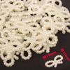 Accesorios al por mayor para manualidades de joyería de perlas pegamento en crema colgante para funda de teléfono llavero pasador lazo flor de amor