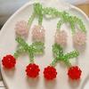 Moño pequeño fresco de cristal doble cereza DIY tejido a mano con cuentas pasador accesorios para el cabello material para aretes al por mayor