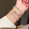 Pulseira geométrica de zircônia rosa retrátil, estilo nicho vintage ins, joias de luxo leve de alta qualidade para atacado