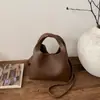 Bolsa de Bolos de Nicho Estilo Coreano para Mujer, Bolso de Mano de Moda Tendencia Nueva Primavera 2026, Bolso Cruzado de Forma de Concha de Alto Valor