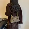 Bolso de Hombro Único de Gamuza Versátil Gran Capacidad 2026 Nuevo Estilo Retro Cadena para Debajo del Brazo Bolso Cruzado para Mujer
