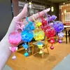 Llavero acrílico con forma de botella de arenas movedizas en aceite, regalo al por mayor, colgante de muñeca de donut, lindo llavero de arenas movedizas.