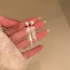 Populares ~ Cadena inteligente Borla de perlas Pendientes largos Femeninos Personalidad de nicho Simples Versátiles Pendientes de temperamento Aguja de plata