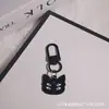 Llavero Colgante de Tarjeta de Tarot Estilo Oscuro Transfronterizo Europeo y Americano Halloween Personalizado Accesorios de Alta Gama para Bolsos y Auriculares Venta al por Mayor