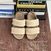 Sandalias de una correa versátiles estilo coreano 2026 para mujer Moda para exteriores Planas de punta abierta Pantuflas de pelo de celebridad de internet para mujer
