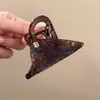 Pinza de Garra de Acetato de Lujo de Gama Alta con Textura Ámbar para Mujer, Nuevo Elegante Pasador de Tamaño Mediano con un Toque Sofisticado, Pinza de Tiburón para Recogido Parcial en la Parte Posterior de la Cabeza