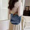 Bolso Cubo Texturizado de Mezclilla Desgastada Estilo Coreano Primavera Verano 2026 Nuevo Versátil Casual Pequeño Bandolera
