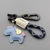 Nuevo Producto Riqueza Inminente Colgante Creativo de Cuero Caballo Pequeño Riqueza Inminente Cuerda Tejida Llavero de Coche Bolso Venta al por Mayor Regalo