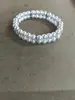 Pulsera de Doble Capa con Perlas y Zirconias Europeas y Americanas Transfronterizas con un Diseño Único, Joyería de Mano Exquisita y Versátil para Mujeres