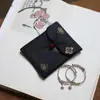 Muestra de pedido final se puede pedir bolsa de tela de brocado para regalo bolsa Wenwan estilo japonés bolsa de almacenamiento de joyas billetera plegable tela