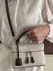 Shuai Mijia 2026 Nueva Moda Bolso de Mano Pequeño Cuadrado para Mujer Estilo Coreano Simple Bolso de Hombro Texturizado de Moda Bolso Cruzado
