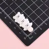 Accesorios de resina de dibujos animados de cachorros de línea Accesorios DIY hechos a mano con pegamento de crema para funda de teléfono llavero pasador imán para refrigerador