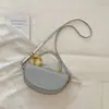 Moda Retro Nueva Primavera/Verano 2026 Bolso de Silla de Montar de Media Luna de Moda Bolso de Hombro Texturizado de Moda para Viajes Diarios para Mujeres