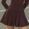 Mono de tenis de estilo europeo y americano más vendido, de manga larga con media cremallera en color marrón oscuro, para fitness al aire libre, con pantalones cortos de seguridad incorporados