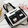 Bolso de hombro coolomi japonés bonito, tutorial de dibujos animados para estudiantes de secundaria y preparatoria, bolso de mensajero portátil de gran capacidad.
