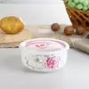 Directo de fábrica horno de microondas refrigerador redondo sellado tazón para huevos al vapor flor de nido de pájaro pegamento sub-tazón refrigerador cerámico recipiente para conservar la frescura