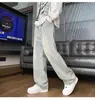 Jeans de estilo americano con cintura elástica y cordón para hombre, finos de verano, talla grande, versátiles de calle, rectos, holgados, de pierna ancha