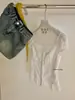 WGWE9507 Ropa de Mujer de las Trece Líneas de Guangzhou 2026 Nueva Blusa de Manga Corta con Adorno de Encaje para Ceñir la Cintura para Verano