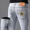 Jeans branco italiano de alta qualidade para homens, estilo fino de verão, calça casual slim fit elástica nova 2026, marca da moda