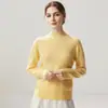 Nueva colección de otoño e invierno: prenda interior de punto de cachemira a la moda, suave y cómoda, color liso, cuello semi-alto, mangas largas y delicada con la piel para mujer