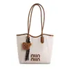 Bolsa Tote de Grande Capacidade para Mulheres 2026 Primavera Nova Moda Estilo Coreano para o Trabalho Casual Elegante Bolsa de Ombro Transfronteiriça