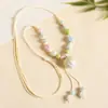 Collar con colgante de campana de mariposa de cerámica de estilo étnico retro para mujer, diseño nuevo y moderno, cadena larga para suéter, accesorios