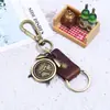 Nuevo colgante de aleación despertador retro llavero de piel de vaca joyería para hombre llavero de coche suministro de comercio electrónico transfronterizo