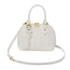 Bolsa Feminina Casual de Grande Capacidade Nicho 2025 Nova Popular Moda Versátil Xadrez Estilo Ombro Único Transversal Bolsa Concha
