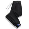 Pantalones de seda de hielo con cordón en los tobillos para hombre, verano, delgados, versión coreana de talla grande, pantalones casuales, tendencia de moda, venta al por mayor, pantalones de nueve puntos