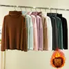 Camiseta de veludo solto de gola alta de manga comprida feminina com gola de pilha interna quente plus size Camisa de base de estilo ocidental grosso outono e inverno Top
