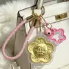 Nuevo llavero de trébol de cuatro hojas para la buena suerte y la riqueza, accesorio de regalo de dibujos animados creativo para bolsos